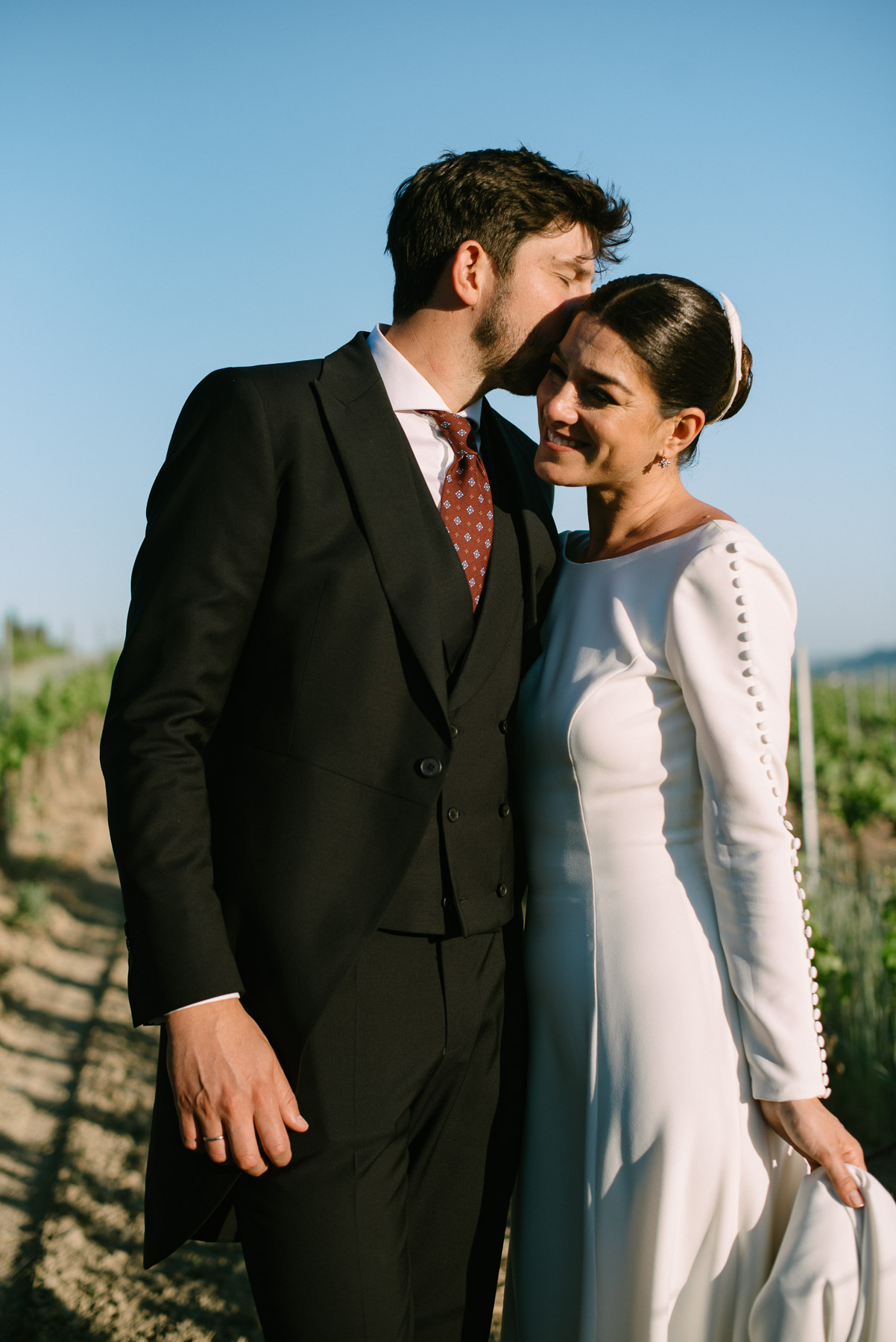 Bride and groom portraits among the vineyards at Bodega Luis Pérez, Jerez